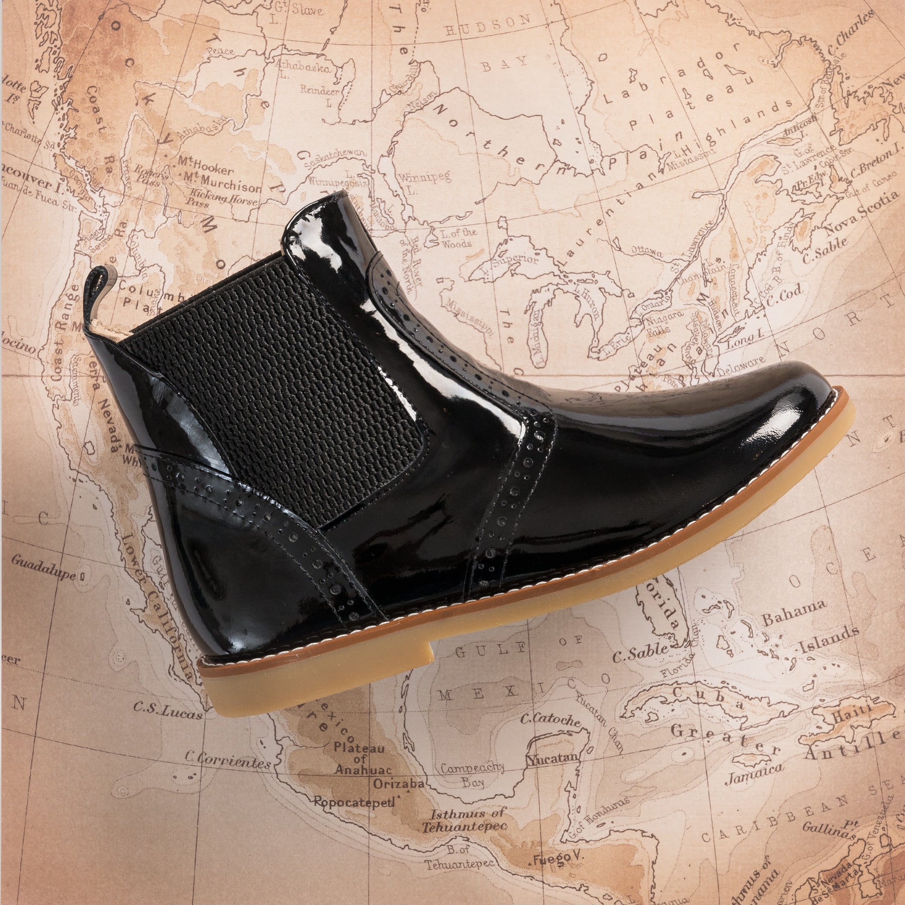 Black patent store leather ankle boots