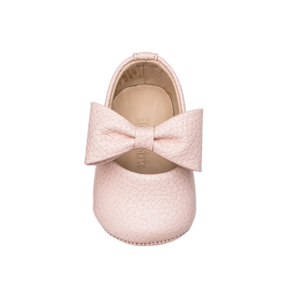 Bebe shoes store with bow